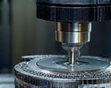 Advanced CNC machine operating on a metal component.